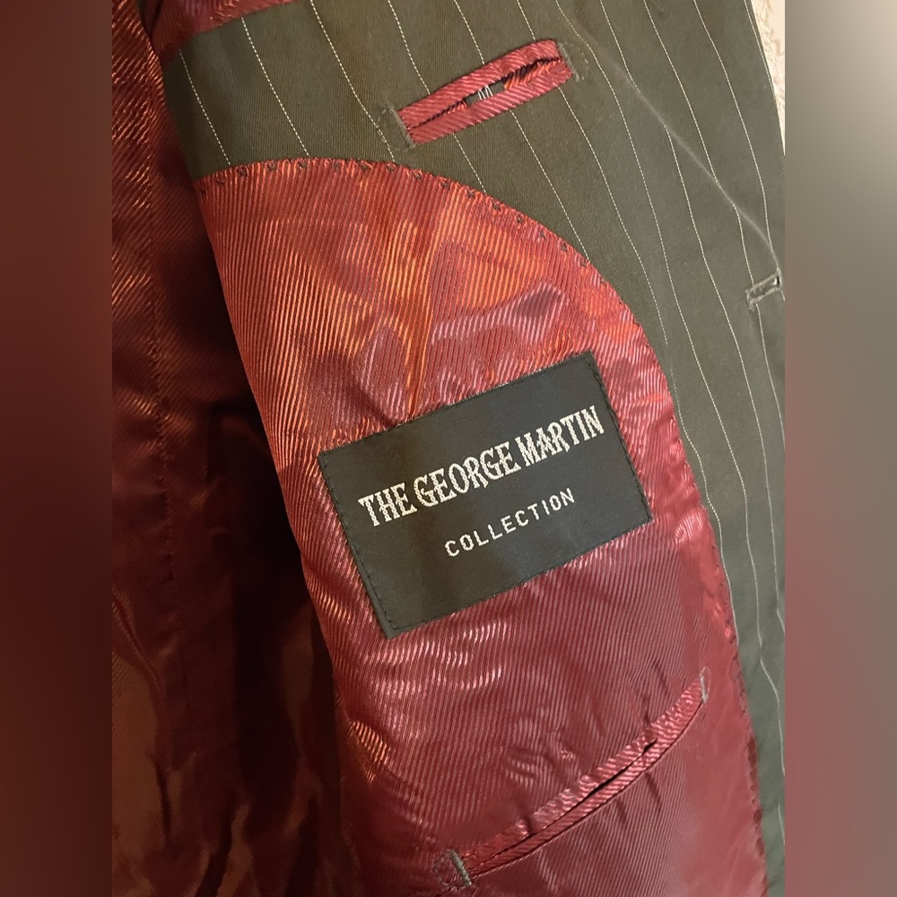 Men’s 2 piece suit. 44R/38. The George Martin Collection